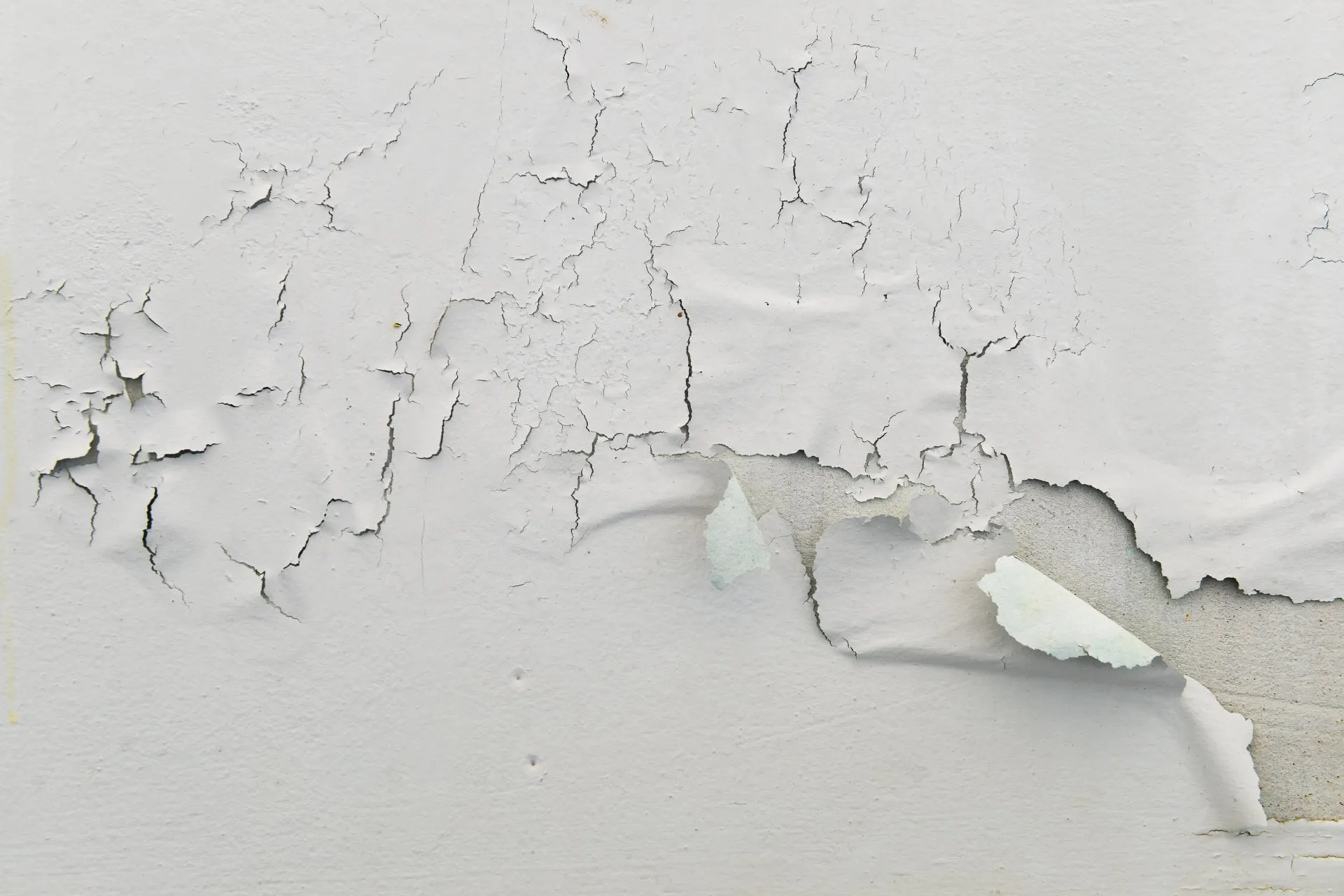 Cracking: This occurs when the paint film becomes brittle and begins to crack, often due to improper surface preparation or using the wrong paint type for the surface.